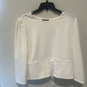 White blouse with sleeve and laced detail